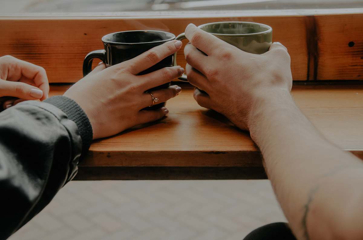 cup person holding mugs photo tulsa